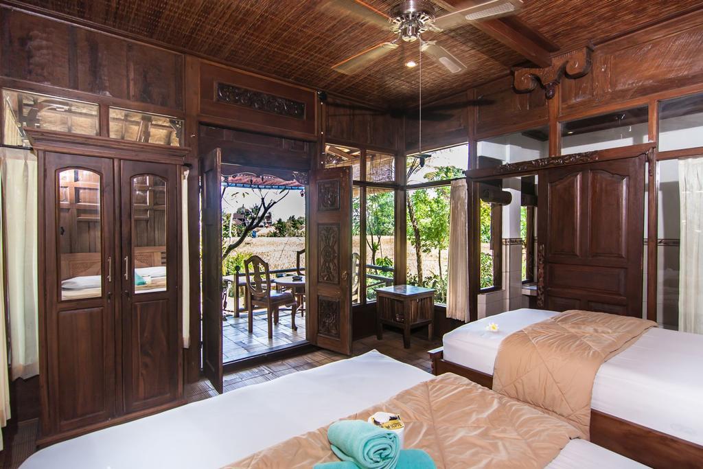 Ganesha Ubud Inn Rom bilde